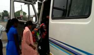 Alighting the mini bus