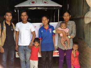 Rotha and her family with the new Tuk Tuk