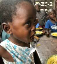 Children eating palm weevil larvae