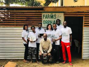 Youth farmers at the orphanage palm weevil farm