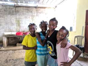 These sweet girls oversee our wash station.