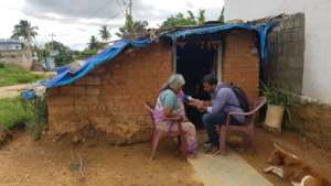 Checking Narasamma's blood pressure at her house