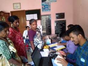 Patients collecting medicines at our mobile clinic