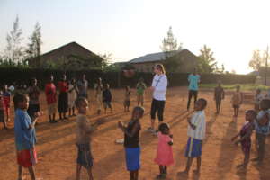 Coach Rebecca working with young kids