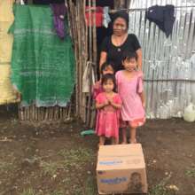Distributing meal packs