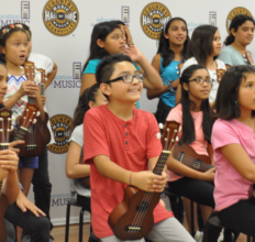 Dorris Place Student Smiles at Songwriting