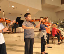 Diego performing at a community event.