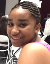 Sunny is all smiles after a violin performance!