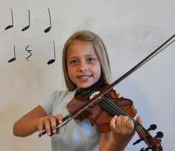 Sydney Smiles with her Violin