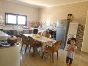 Jalal's children in the kitchen