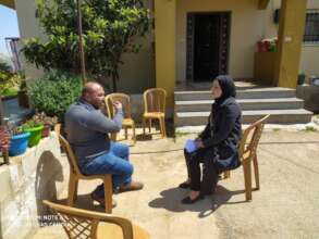 Roba and Hisham talking through plans.