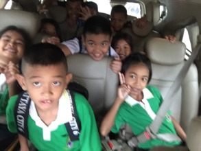 Children riding in new GRACE van