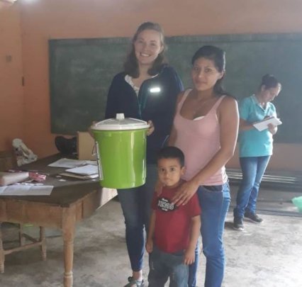 Volunteer Lizzie Distributing Water Filters