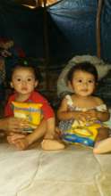 Two of Enermila's youngest with Chispuditos
