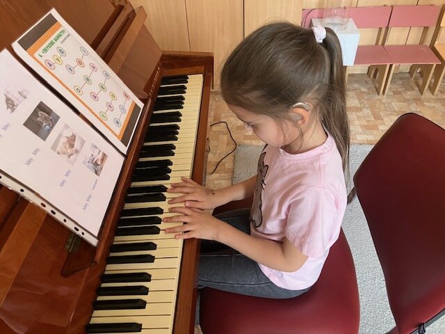 Little Liza really enjoys music lessons