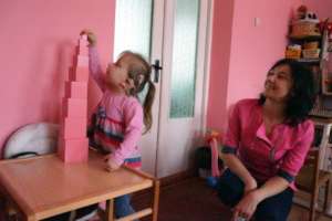 Photo 2. Liza builds a tower