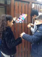 Children creating plaques