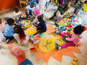 Children enjoying creative time with LEGO