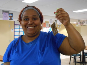 A woman with keys to her new home!