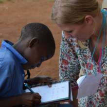 ConnecTeach Program Director with Iganga student