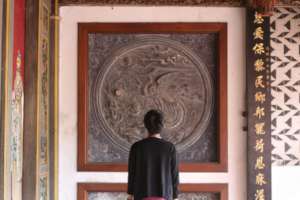 Admiring the Cu An Kiong temple in Lasem.