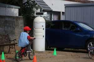 Child plays near radiation monitoring post