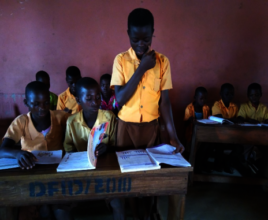 Baajobu leading reading session in class