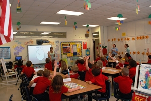 Programs Director Anna Keene leads a Bay Buddy Presentation