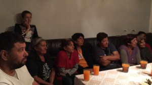 Listening intently to others sharing ideas
