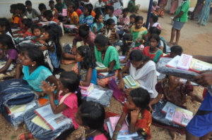 rural children receive school bag, notebooks etc