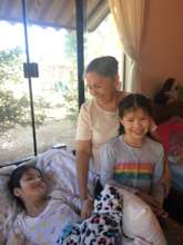 RVF patient with her twin sister and grandmother