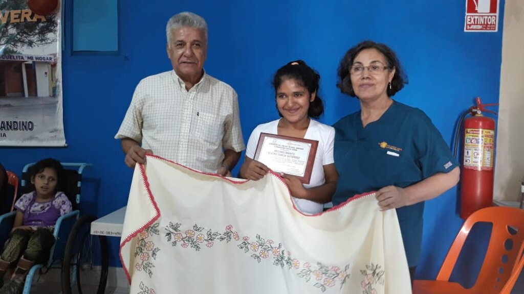 Miriam shows her sewing skills