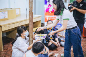 Children at Ceporer Hocmon receive gifts from MSD