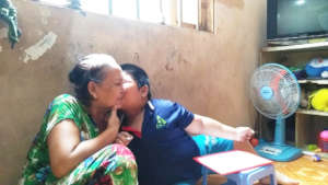 Ph. with his grandmother