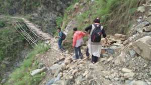 Crossing primitive bridge on the way to Sarikhet