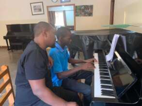 Ruth in her piano class