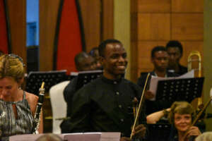 David being applauded for his Clarinet Concertina