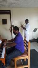 Ian with his teacher Shafic during lesson