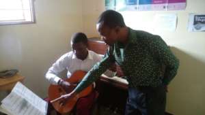 John Paul having a lesson