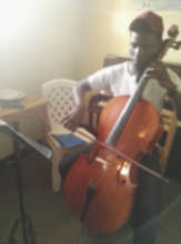 John Paul playing the cello