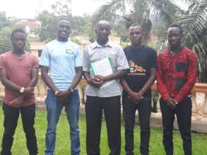 Teacher Godfrey with the Brass Students
