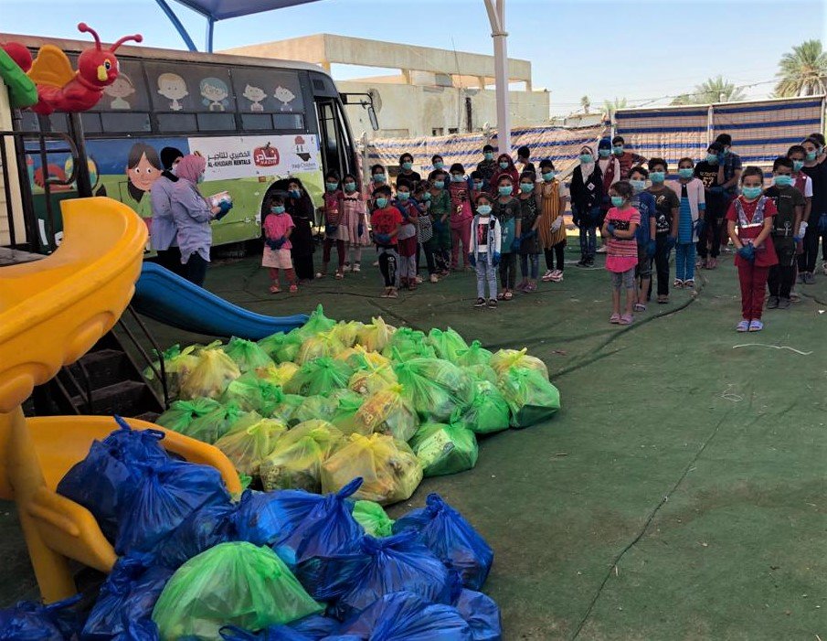 Gathering at Hope Bus 2 for food, hygiene supplies