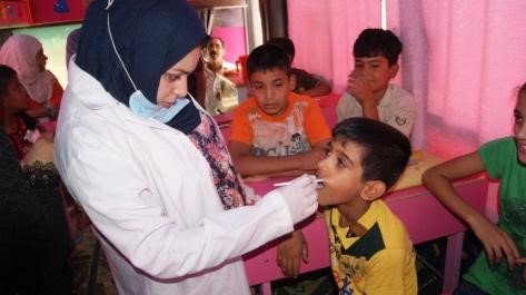 Street Lawyers, Doctors, Hope Buses for Iraqi Kids