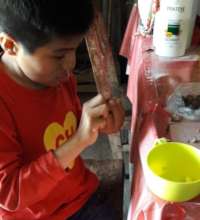 Jose peeling garlic