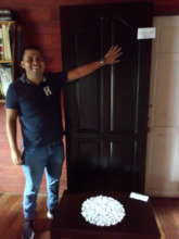 Our expert salesman and a door made from wood