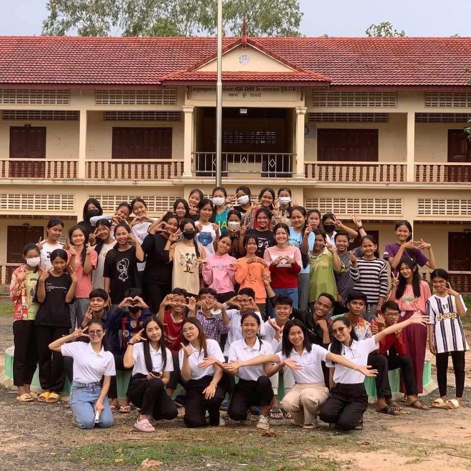 Rina, front row, at the high school project