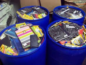 Drums with school books and supplies