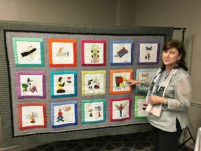 The 2016 refugee quilts are admired at US events