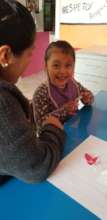 Child with cerebral palsy and autism learning