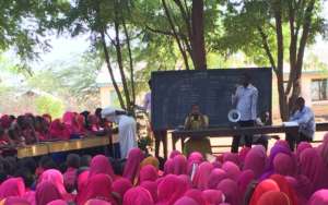 Dadaab coaches speaking to a community gathering
